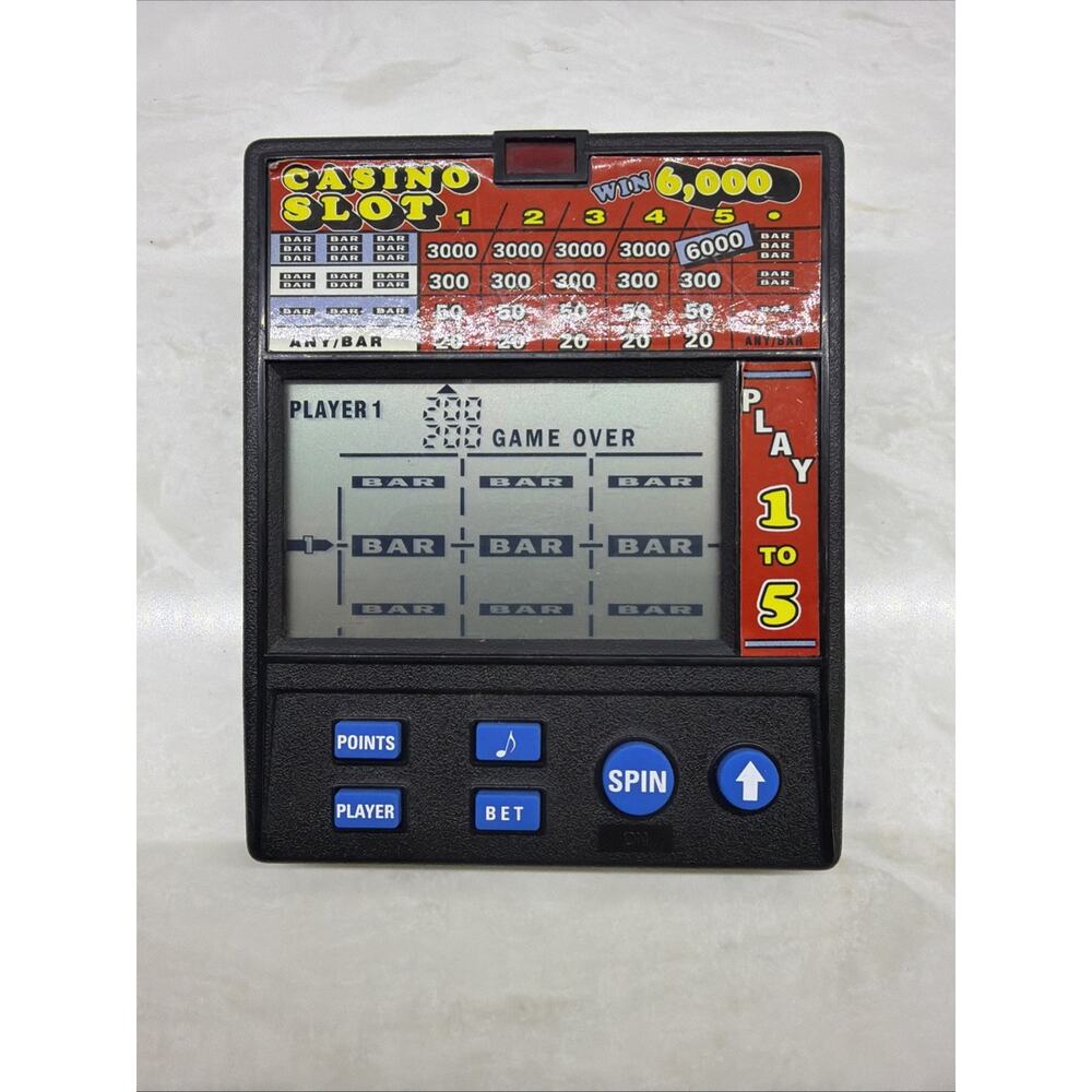 Vintage Radica Casino Slot 6,000 (Model 1470) Electronic Handheld Game TESTED